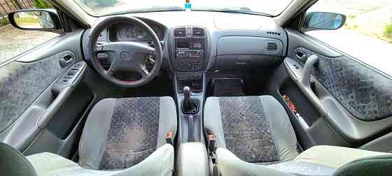 Mazda 323 1999 an Sucleia Sucleia