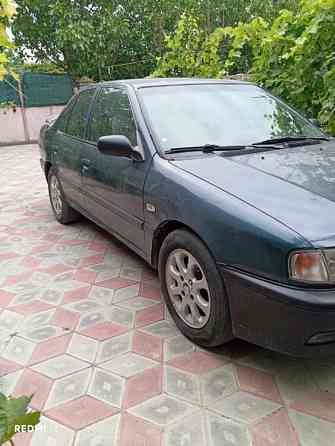 Nissan Primera 1993 год Парканы Parcani