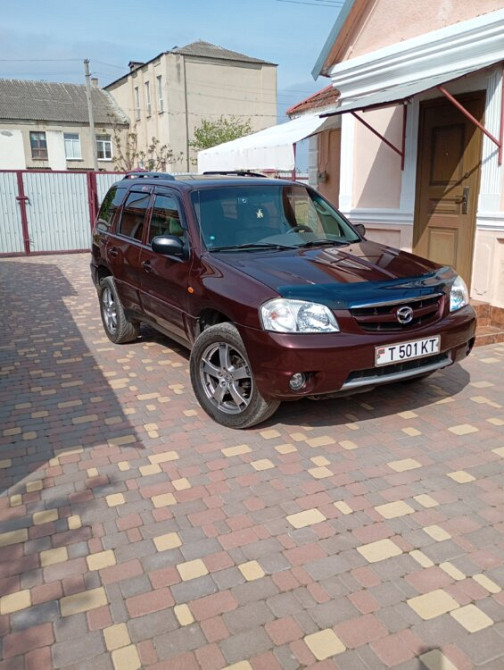 Mazda Tribute 2002 год Парканы Парканы - изображение 1