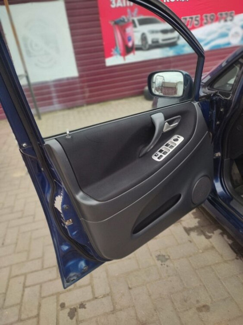 Suzuki Liana 2005 год Бендеры Bender - fotografie 4