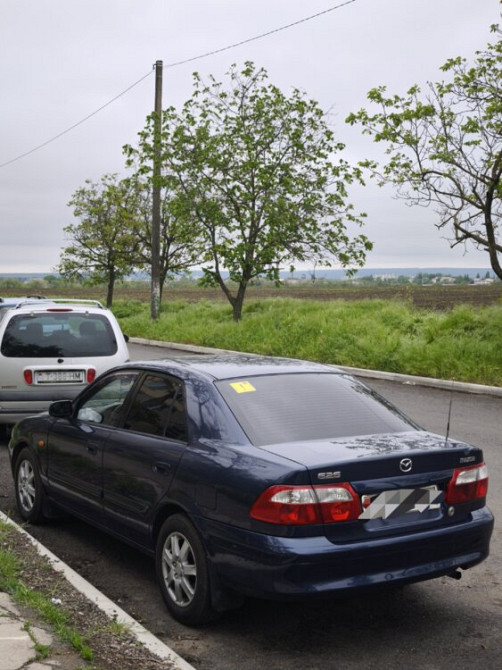 Продам Mazda 626, 2000 г. в. Бензин, двигатель 1.8 (101 л. с. ). Bender - fotografie 4
