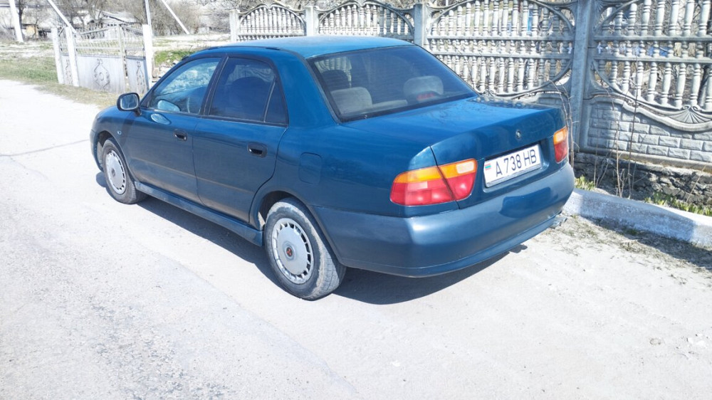 Продаётся Mitsubishi Carisma 1997 г. 1.6 бензин-МЕТАН 18 КУБ 1 баллон Рыбница - изображение 3