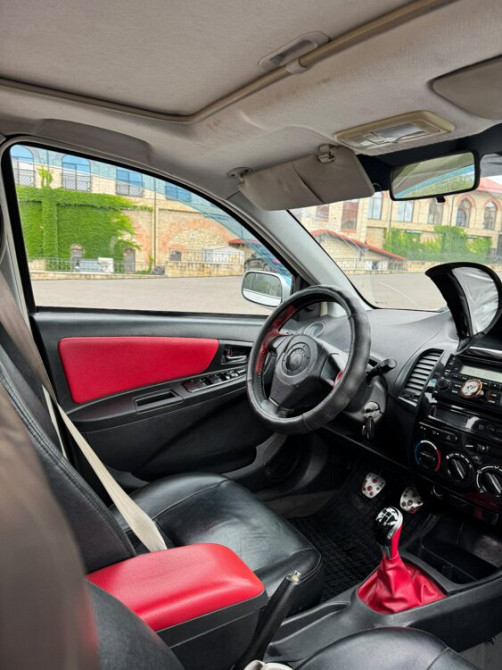 Geely MK Cross Bender - fotografie 7