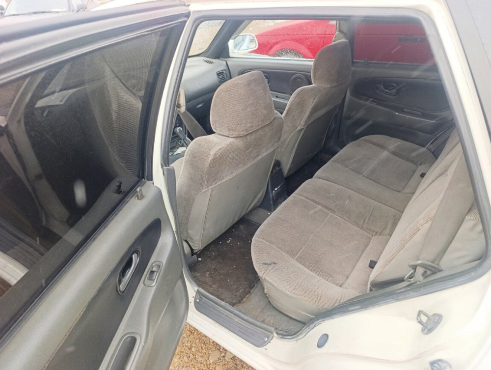 Mitsubishi Lancer 1994 an Bender Bender - fotografie 7