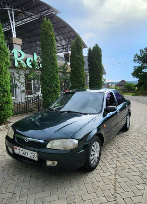 Mazda 323 1999 год Суклея Sucleia - photo 2