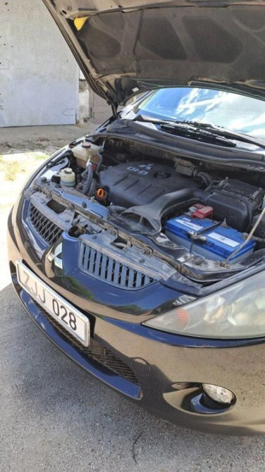 Mitsubishi Grandis 2006 год Бендеры Bender - photo 6