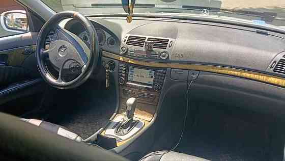 Mercedes E-Class 2004 год Суклея Суклея