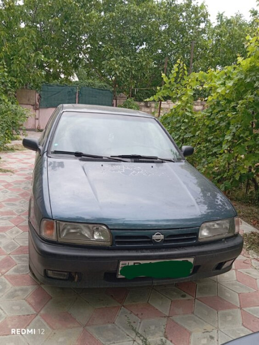 Nissan Primera 1993 год Парканы Парканы - изображение 1